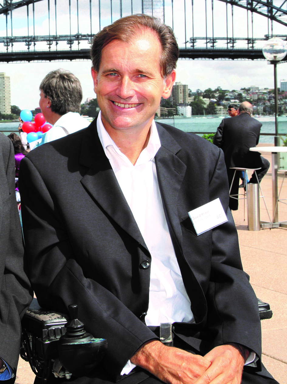 David Prast in front of the Sydney Harbour Bridge